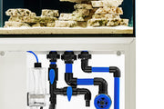 Rimless UNS Reef System R60 aquarium by Ultum Nature Systems, clear glass tank with sleek edges and modern design.