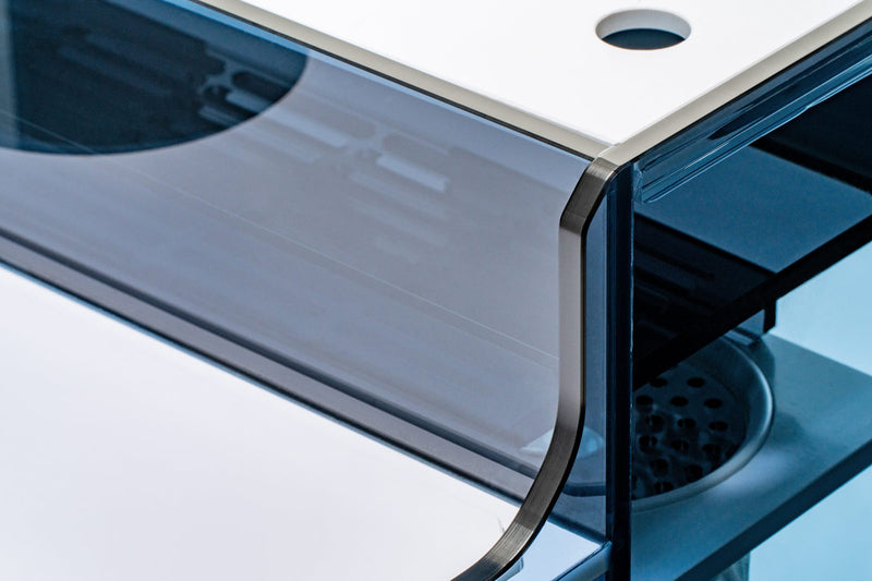 Rimless UNS Reef System R90 aquarium by Ultum Nature Systems, clear glass tank for marine or reef setups.