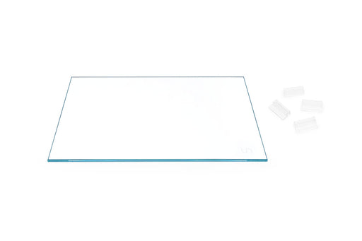 Clear rimless glass lids for aquariums by Ultum Nature Systems, designed to fit UNS tanks and provide a sleek, unobstructed view.