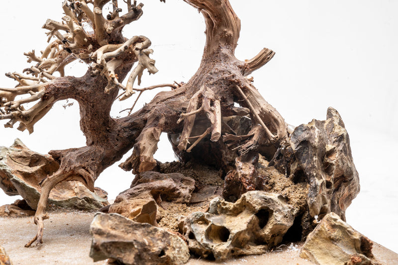 close up of wood attached to stone on resin mat