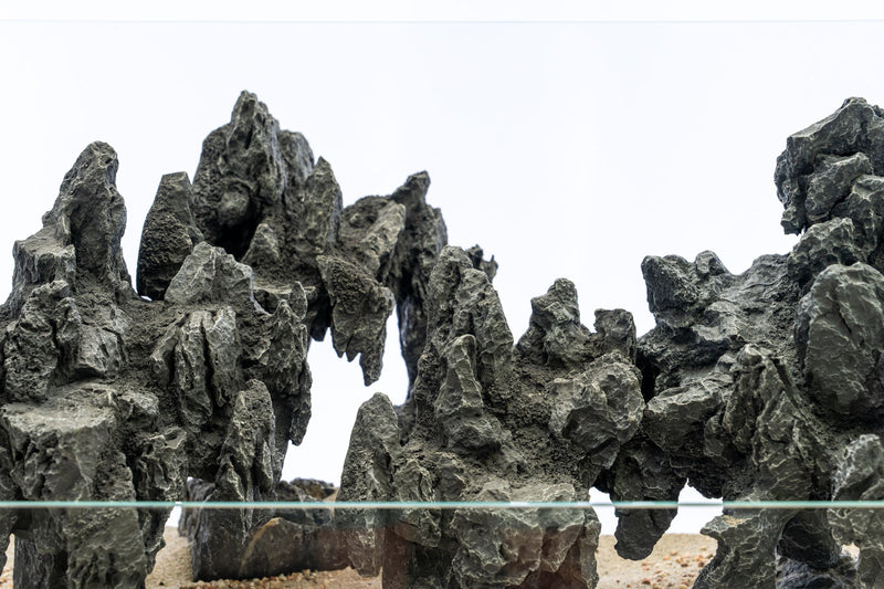 Black UNSHARDSCAPE Strata Seiryu Stone Type 3 E, natural decorative stone for landscaping and garden design.