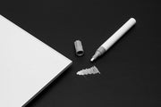 Ultum Nature Systems UNS Touch Up Pen with aluminum stand, sleek accessory for plant care and maintenance.