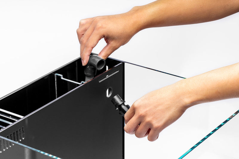 Ultum Nature Systems VCA Flow Kit for UNS Dual AIO Reef Aquarium, includes pumps and tubing for water circulation.