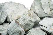 Green Verdant Stone from UNSHARDSCAPE showcasing a smooth, polished natural stone with vibrant green hues and unique texture.