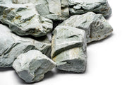 Green Verdant Stone from UNSHARDSCAPE showing a smooth, polished natural stone with rich green hues and subtle texture.