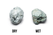 Green Verdant Stone from UNSHARDSCAPE, showcasing a textured natural stone with vibrant green and earthy tones.