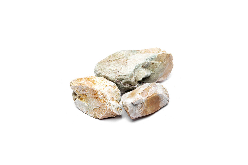 Yukon Canyon Stone from UNSHARDSCAPE showing natural textured stone with earthy tones for landscape or patio use.