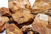 UNSHARDSCAPE Yukon Canyon Stone showing a natural, textured stone surface ideal for landscaping and outdoor projects.