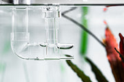 Aquario Neo Skimmer Invincible accessory showing a compact aquarium protein skimmer with clear plastic components and adjustable parts.
