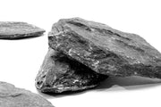 Black slate hardscape tile by UNSHARDSCAPE, showing smooth, dark slate surface suitable for outdoor landscaping projects.