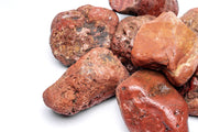 Blood Stone from UNSHARDSCAPE, a natural red stone with blood-red patterns, shown in a close-up image.