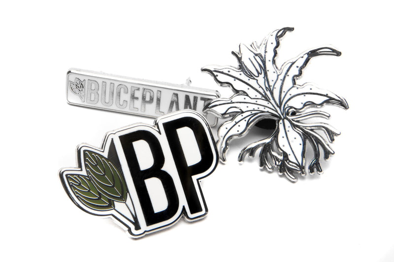 Buce Plant enamel pin from BP Apparel, featuring a detailed green plant design on a metal pin for apparel accessories.