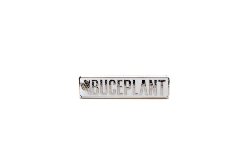 Buce Plant enamel pin from BP Apparel, featuring a detailed green plant design, perfect for apparel accessories.