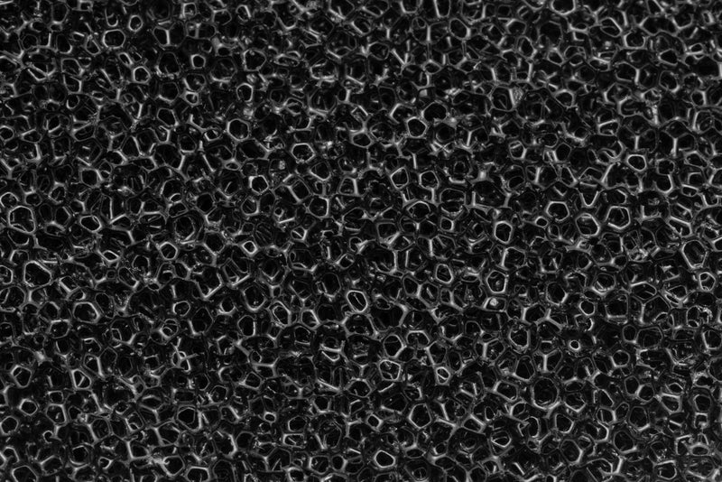 Black Delta 90 sponge filter from UNSFILTER, showing a close-up of the textured foam used for filtration in aquariums.