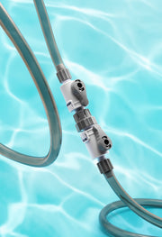 UNSFILTER DELTA quick-release double tap valves for filters, showing the sturdy metal construction and quick-connect fittings.