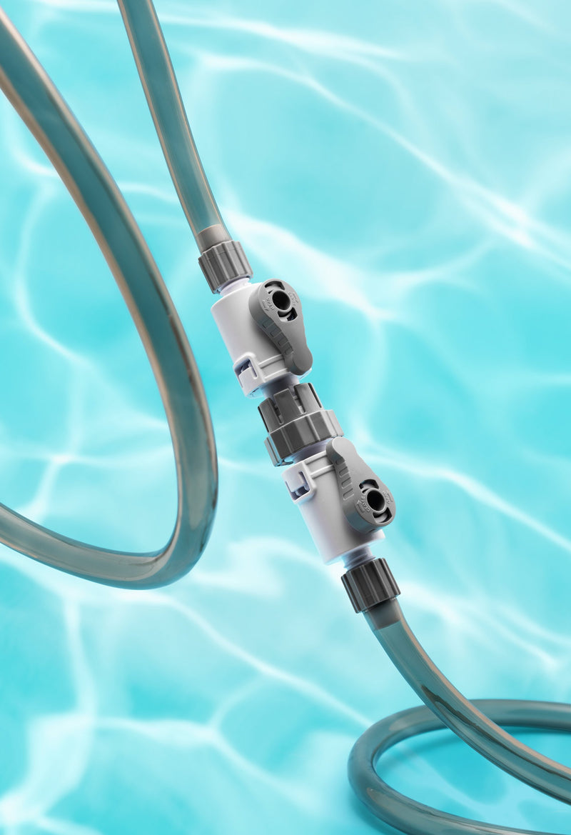 UNSFILTER DELTA quick-release double tap valves for filters, showing the sturdy metal construction and quick-connect fittings.