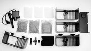Dymax eZ Filter for water purification, showcasing the compact filter unit with clear plastic housing and filter media inside.