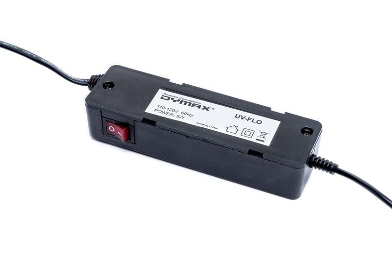 Dymax UV Flo inline steriliser filter with transparent housing and UV light component for water purification.