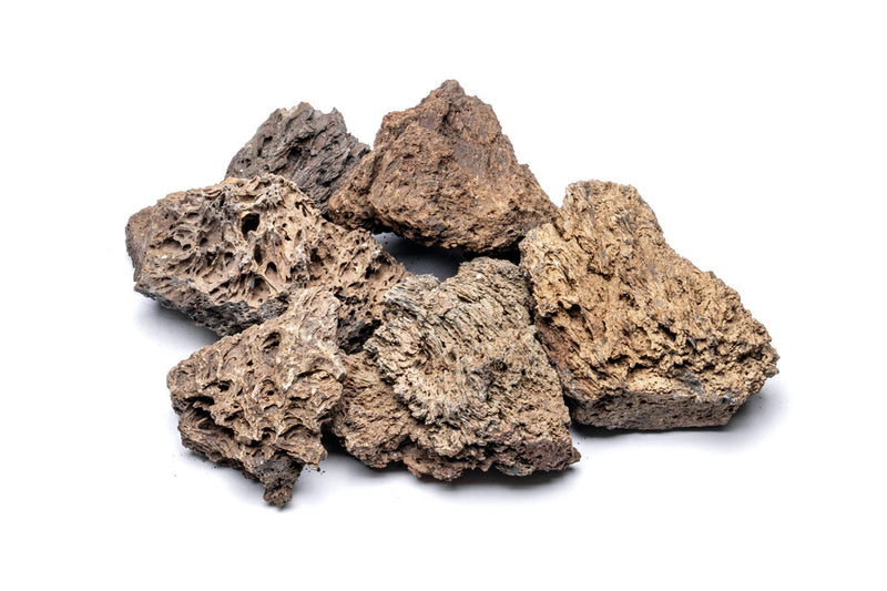 UNSHARDSCAPE Fire Stone, a natural decorative stone with fiery red and orange hues, ideal for landscaping or fire pits.
