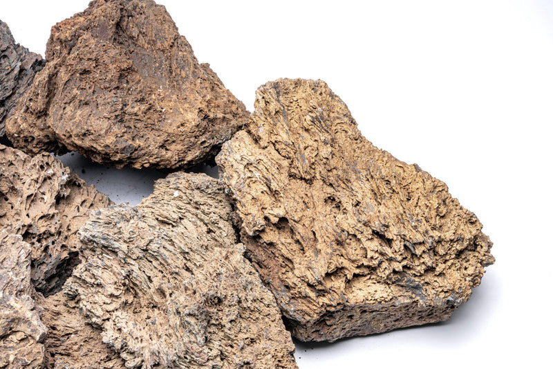 Burnt orange fire stone from UNSHARDSCAPE, showing its textured, natural stone surface ideal for decorative and craft use.
