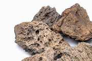 UNSHARDSCAPE fire stone, natural decorative stone with fiery red and orange hues, perfect for garden or landscape accents.