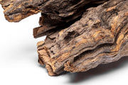 Small piece of natural forest driftwood from UNSBONSAI, showcasing weathered wood with textured surface and organic shape.