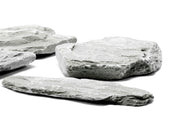 Gray River Slate hardscape stone by UNSHARDSCAPE, showing a natural textured grey slate surface for landscaping projects.