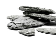 Grey River Slate hardscape stone by UNSHARDSCAPE showing textured, natural grey slate surface for outdoor landscaping or paving.