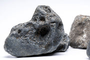 Hakkai Accent Stone by UNSHARDSCAPE, smooth gray decorative stone for landscaping or garden accents.
