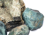 Smooth green jade stone from UNSHARDSCAPE, showcasing its polished surface and natural texture.