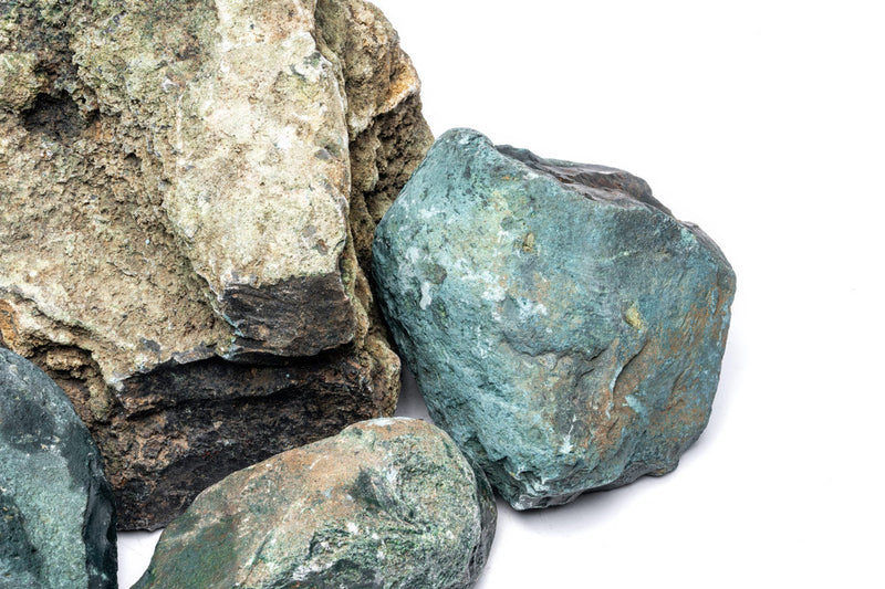 Smooth green jade stone from UNSHARDSCAPE, showcasing its polished surface and natural texture.