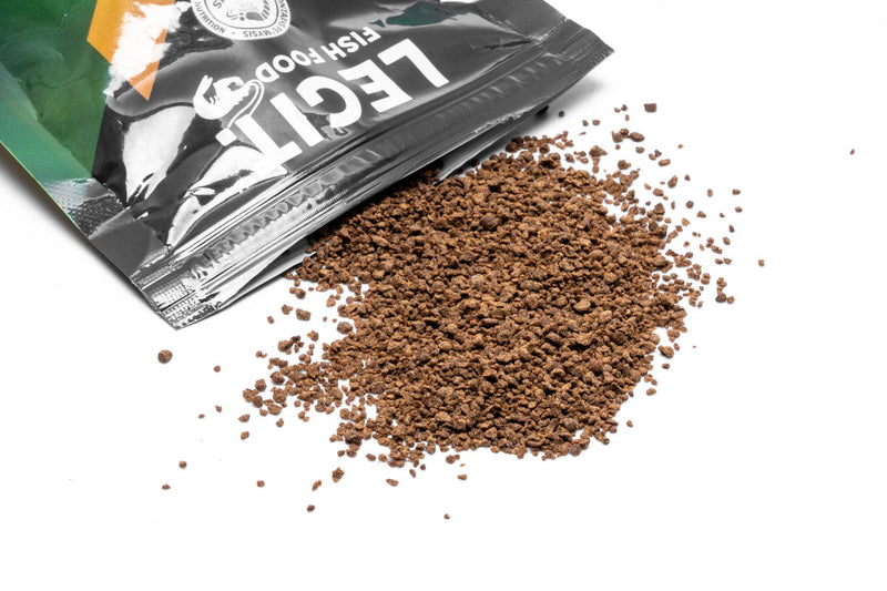 LFF Legit Fish Food Community mix in a clear container, suitable for feeding various freshwater and community fish species.