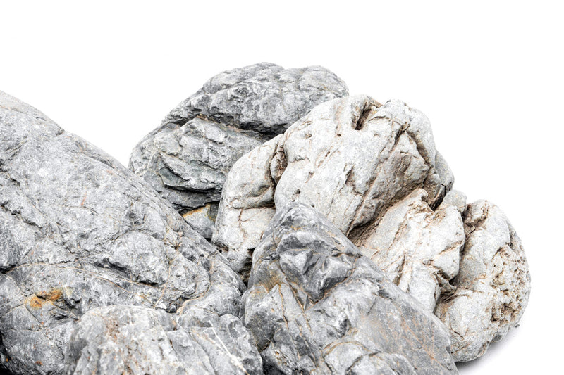 UNSHARDSCAPE Marsh Stone, a natural decorative stone with a textured surface, ideal for landscaping and garden projects.