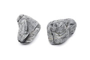 UNSHARDSCAPE Marsh Stone, natural decorative stone with a textured surface, used for landscaping and garden design.