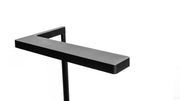 ONF Flat Nano Stand LED light on a desk, compact lighting device with adjustable stand for photography or video illumination.