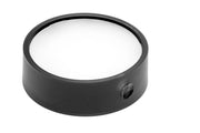 ONF Mist O Puck LED light illuminated in a modern lighting setting, showcasing compact design and vibrant glow.