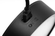 ONF Mist O Puck LED light displaying a sleek, compact lighting device with a modern design and illuminated surface.