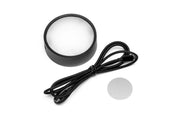 ONF Mist O Puck LED light showing a compact, circular lighting device with a sleek design and illuminated surface.