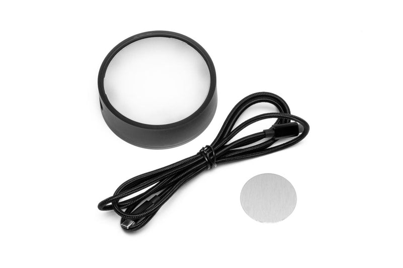 ONF Mist O Puck LED light showing a compact, circular lighting device with a sleek design and illuminated surface.
