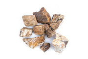 Close-up of a polished petrified wood stone by UNSHARDSCAPE, showcasing rich natural wood grain and mineral textures.