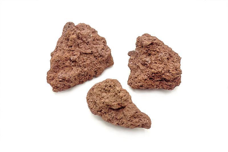 Red lava rock stone from SB, showing a porous, deep red textured volcanic rock suitable for décor or gardening.