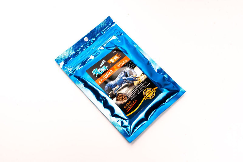 SL AQUA MORE Crayfish food in 30g packaging, showing colorful dried crayfish for aquatic pet nutrition.