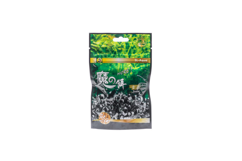SL AQUA MORE Snow food package with colorful branding, designed for aquatic pets, featuring a clear container and product label.