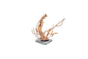 Unshardscape Spiderwood driftwood arranged on dark slate surface, showcasing natural twisted wood for decorative or artistic use.
