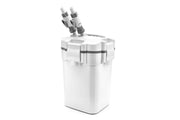 ULTUM Nature Systems DELTA 120 Aquarium Canister Filter V2 by UNSFILTER, showing the compact filter with inlet and outlet hoses.