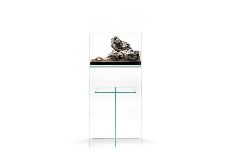 Ultum Nature Systems UNS 45U glass aquarium stand supporting an aquarium with sturdy glass panels and modern design.
