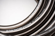 Flexible UNSFILTER tubing used for filtration systems, shown in a close-up image of the clear, durable filter tubing.
