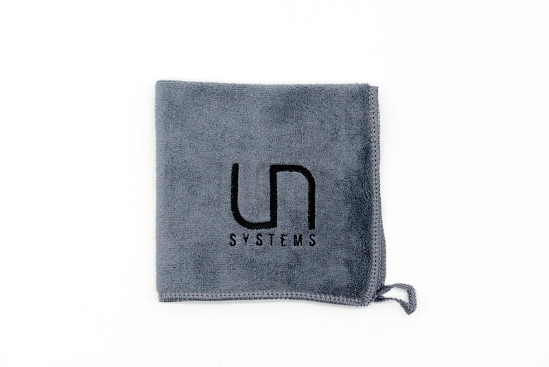 Ultum Nature Systems UNS Microfiber Towel, a soft and lightweight accessories towel displayed flat on a surface.