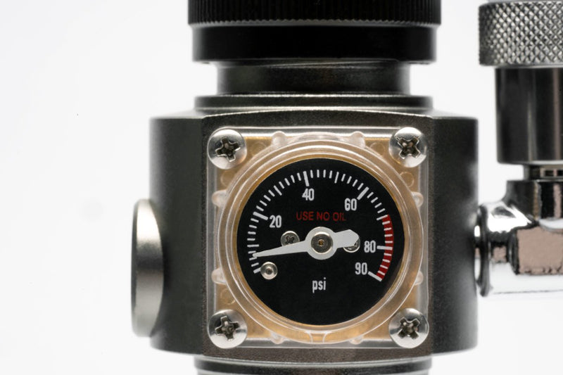 UNS Mini Dual Stage CO2 Regulator for precise control of CO2 flow, featuring gauges and adjustment knobs.